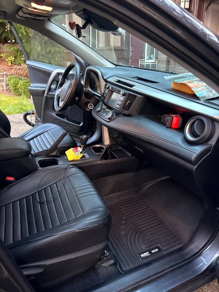 Tesla cargo space with seats folded — after detail