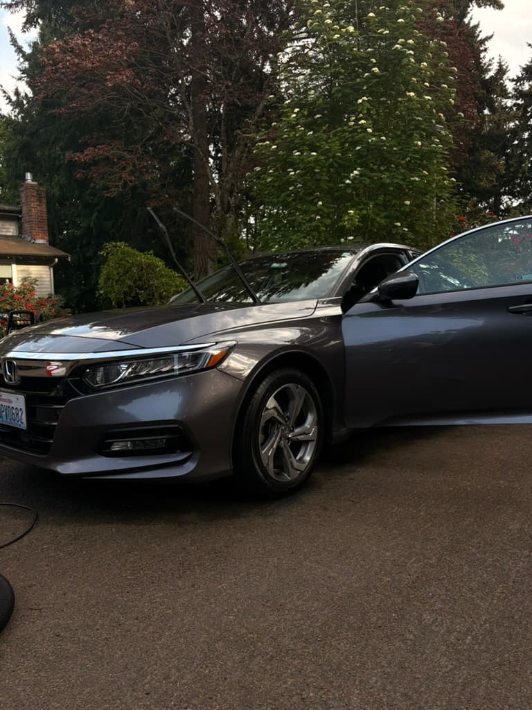 Honda Accord exterior after detail on a wet driveway